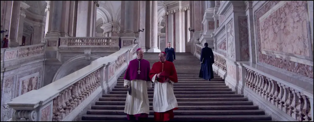 Ralph Fiennes, Stanley Tucci, in Conclave