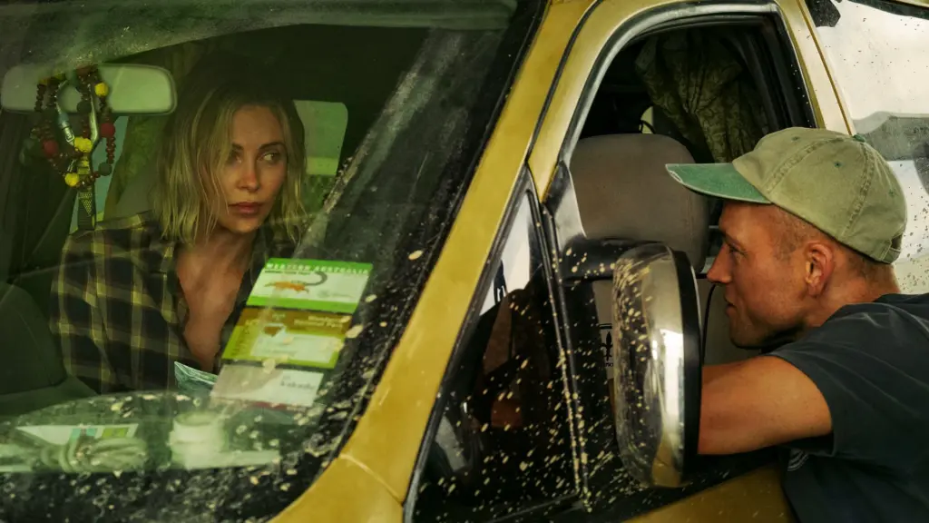 Charlize Theron, Eric Bana, and Taron Egerton star